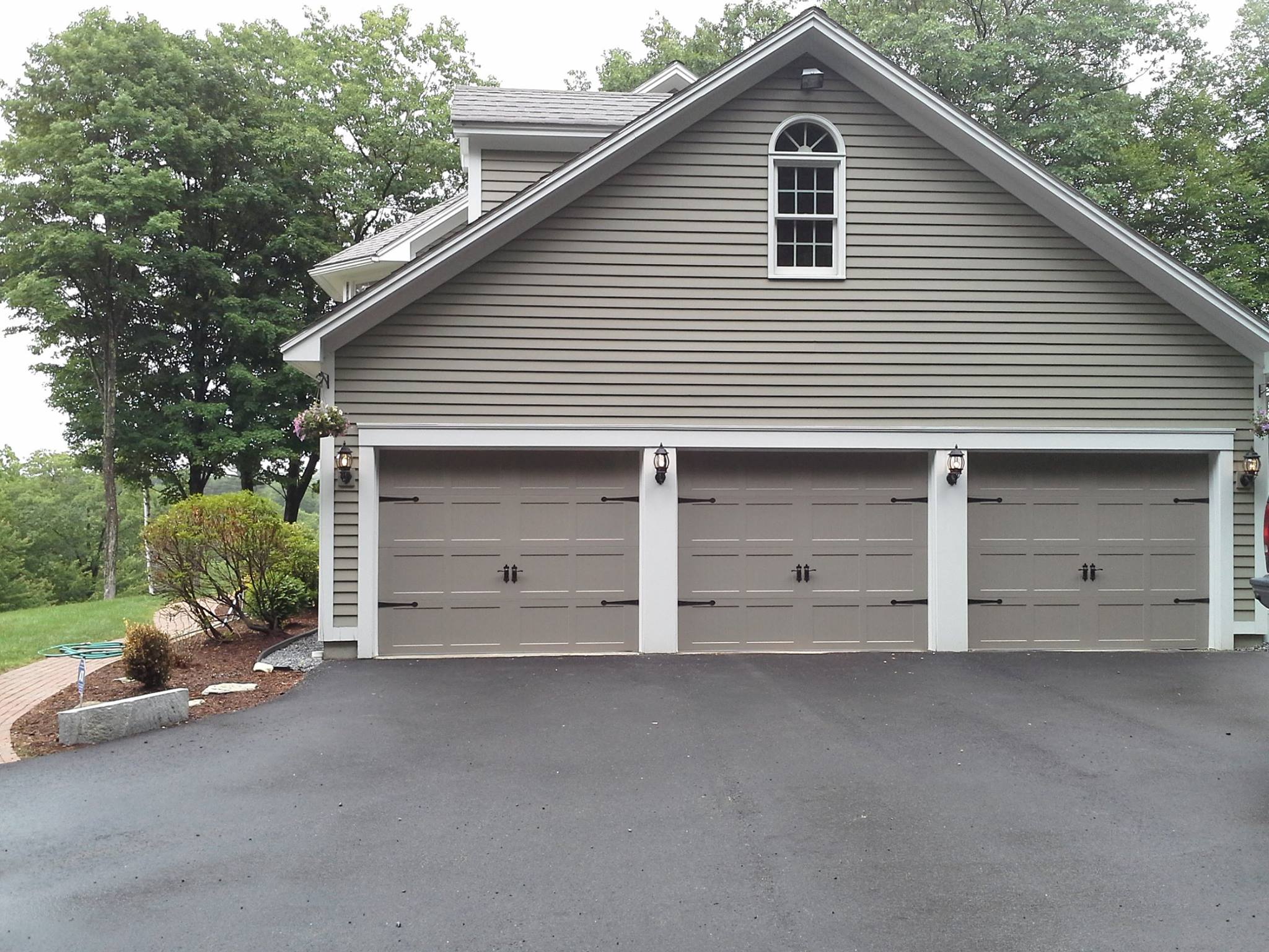 3 Car Garage Installation with Carriage Style Doors
