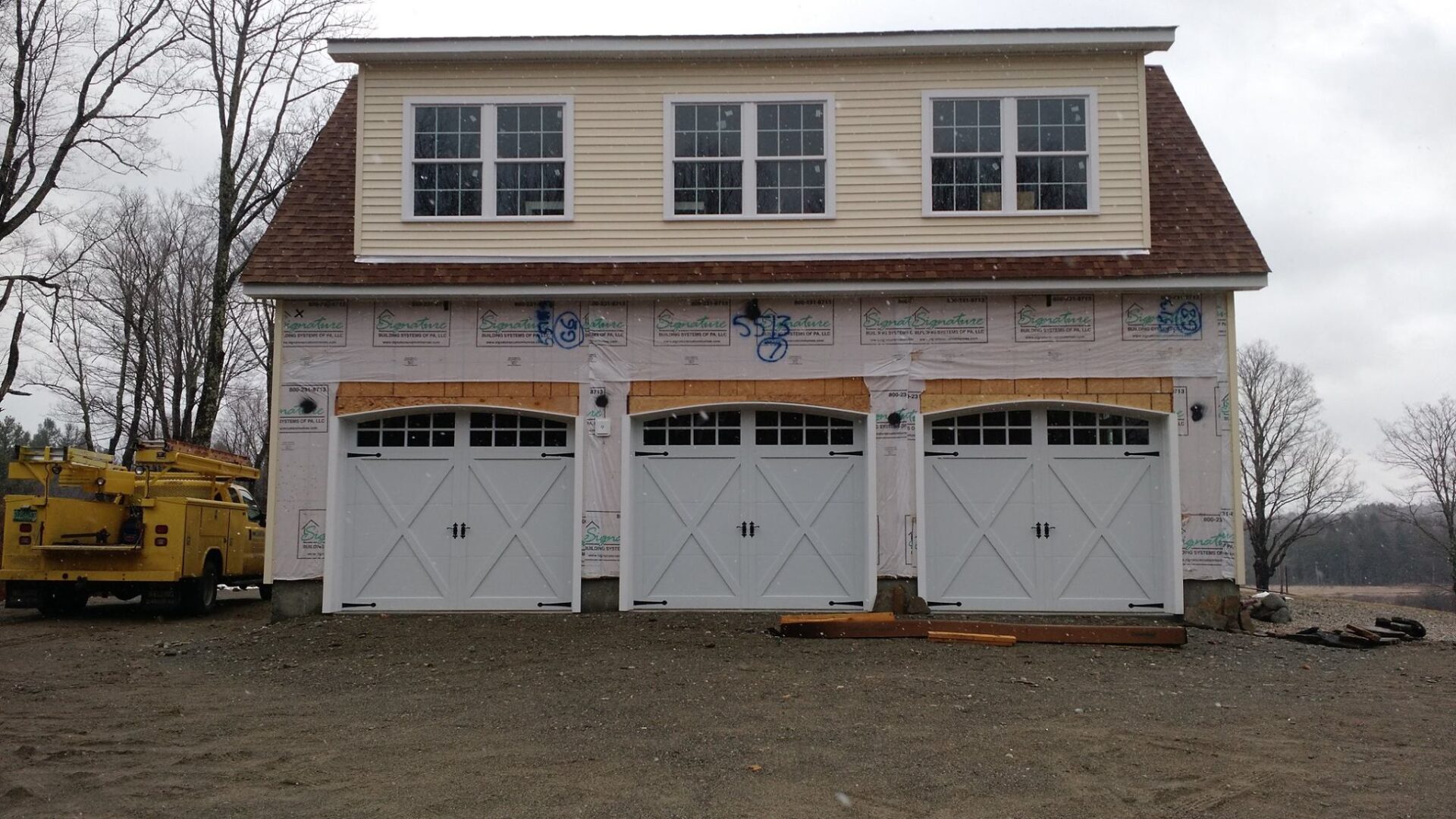 3 Car Garage Door Installation with Carriage Style Doors